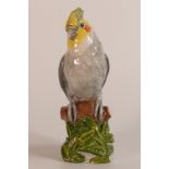 Beswick England prototype figure of a Parrot, standing on a tree branch in colours of grey, yellow