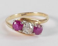 18ct gold ruby & diamond three stone ring, set with two round brilliant cut rubies each 4.4mm x 4.