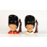 Royal Doulton small character jugs The Guardsman D6771 in two colour ways (2)