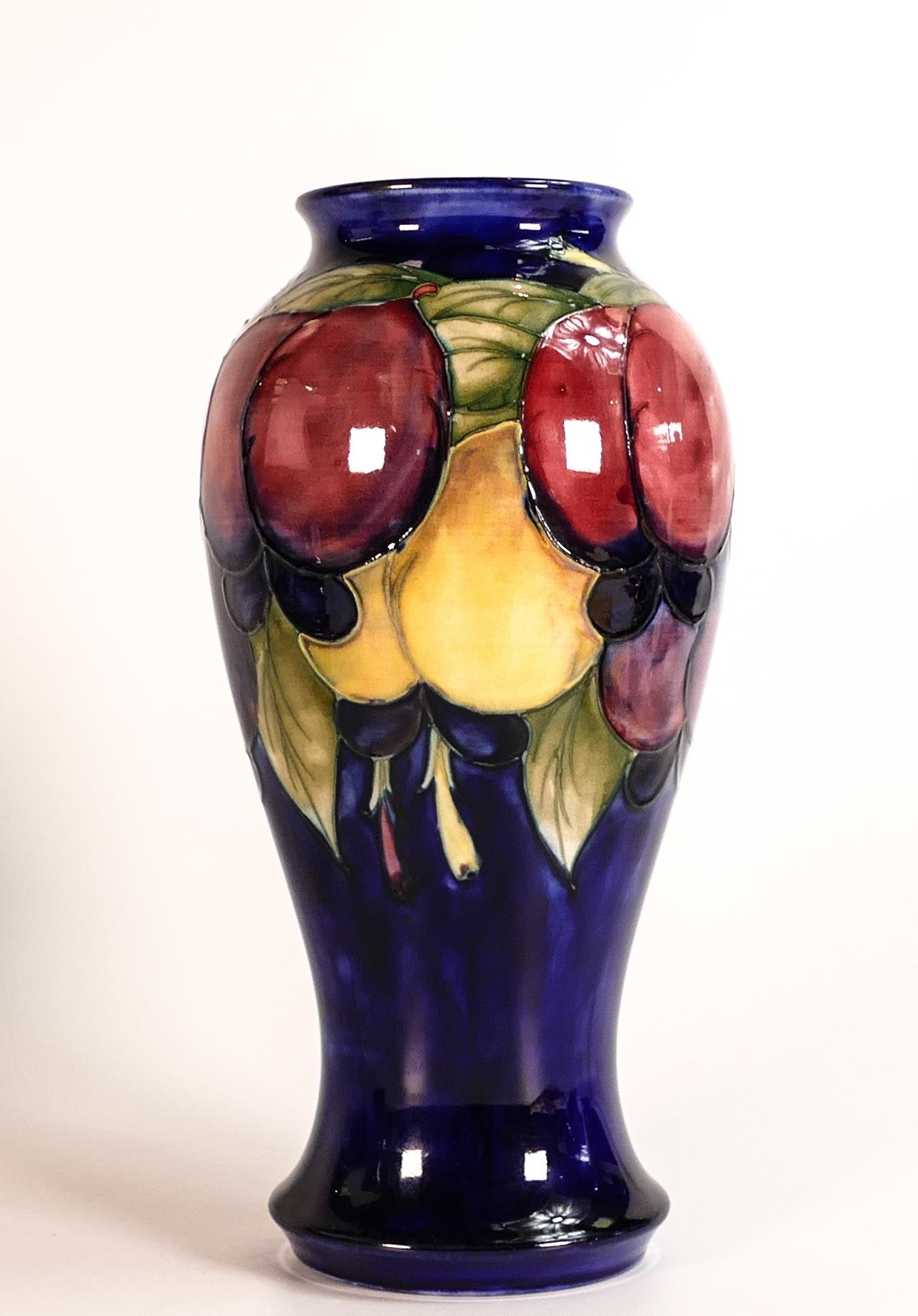 William Moorcroft vase decorated in the Wisteria design, c1925, h.23.5cm.