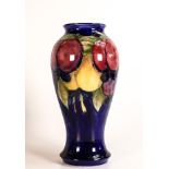 William Moorcroft vase decorated in the Wisteria design, c1925, h.23.5cm.