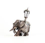 Anglo-Indian silver and ebony jewelled elephant, 11.5cm high