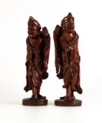 Pair of Chinese Rootwood figures depicting elders, wearing bead necklaces and missing staffs. Height