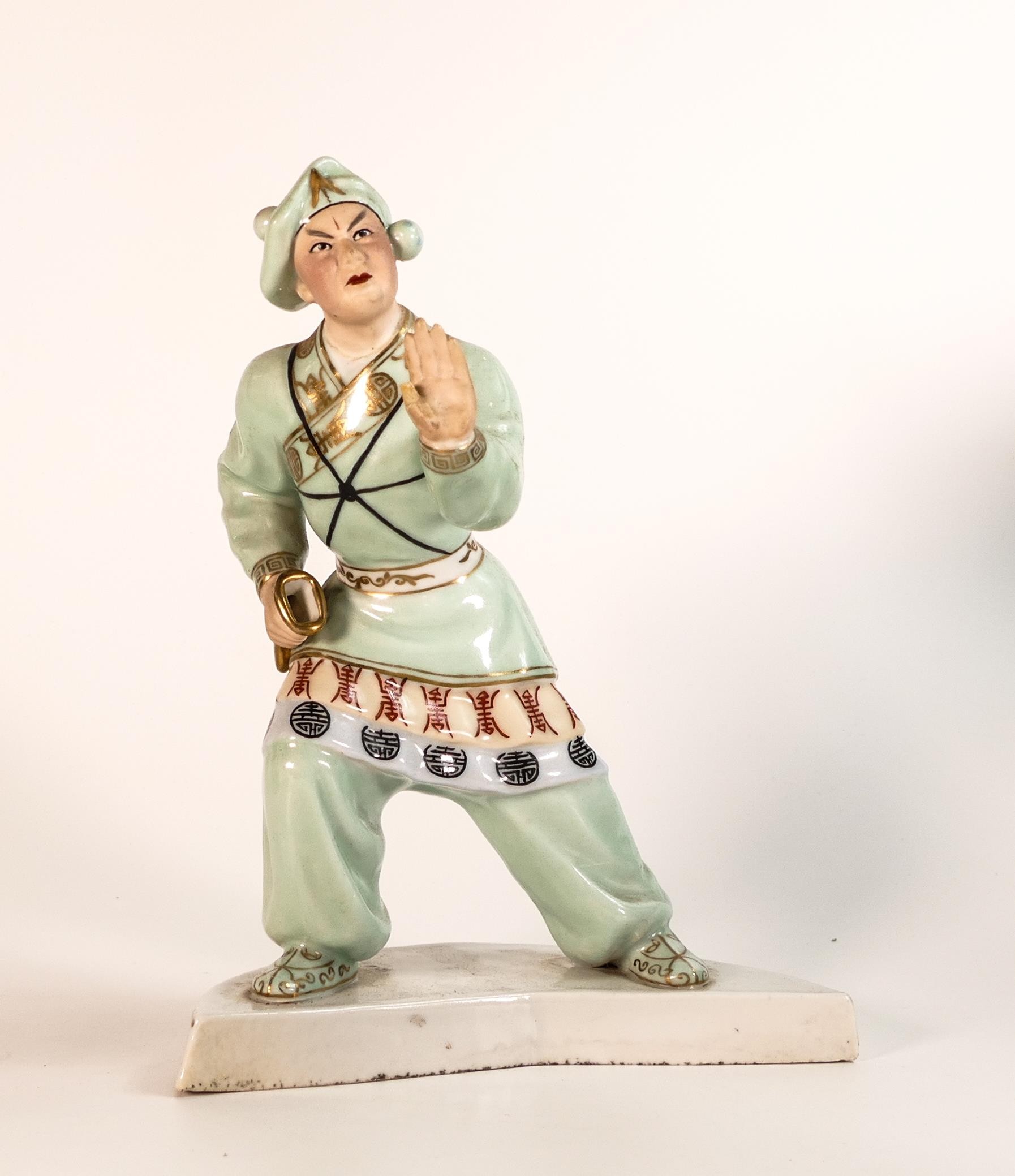 Porcelain figure of Chinese martial arts teacher, h.23.5cm, missing sword, a.f.