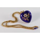 A Victorian enamel heart shaped pendant & chain, the pendant heart shaped with blue enamel front set