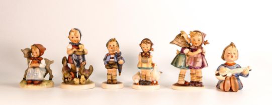 A collection of Goebel Hummel figures including 196/0 'Telling her a Secret', Feeding Time 199, Home
