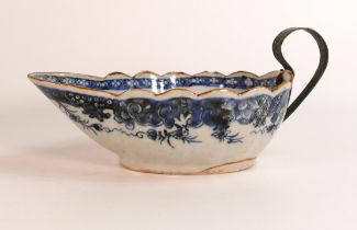 An 18th century Chinese Export Porcelain sauceboat with additional wrought iron handle. Decorated in