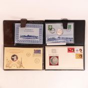 A collection of First Day Cover medallic coin proof sets comprising 1977 Papua New Guinea, 1977