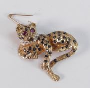 9ct gold hallmarked leopard (or similar animal) brooch set diamonds, rubies & sapphires. Measures