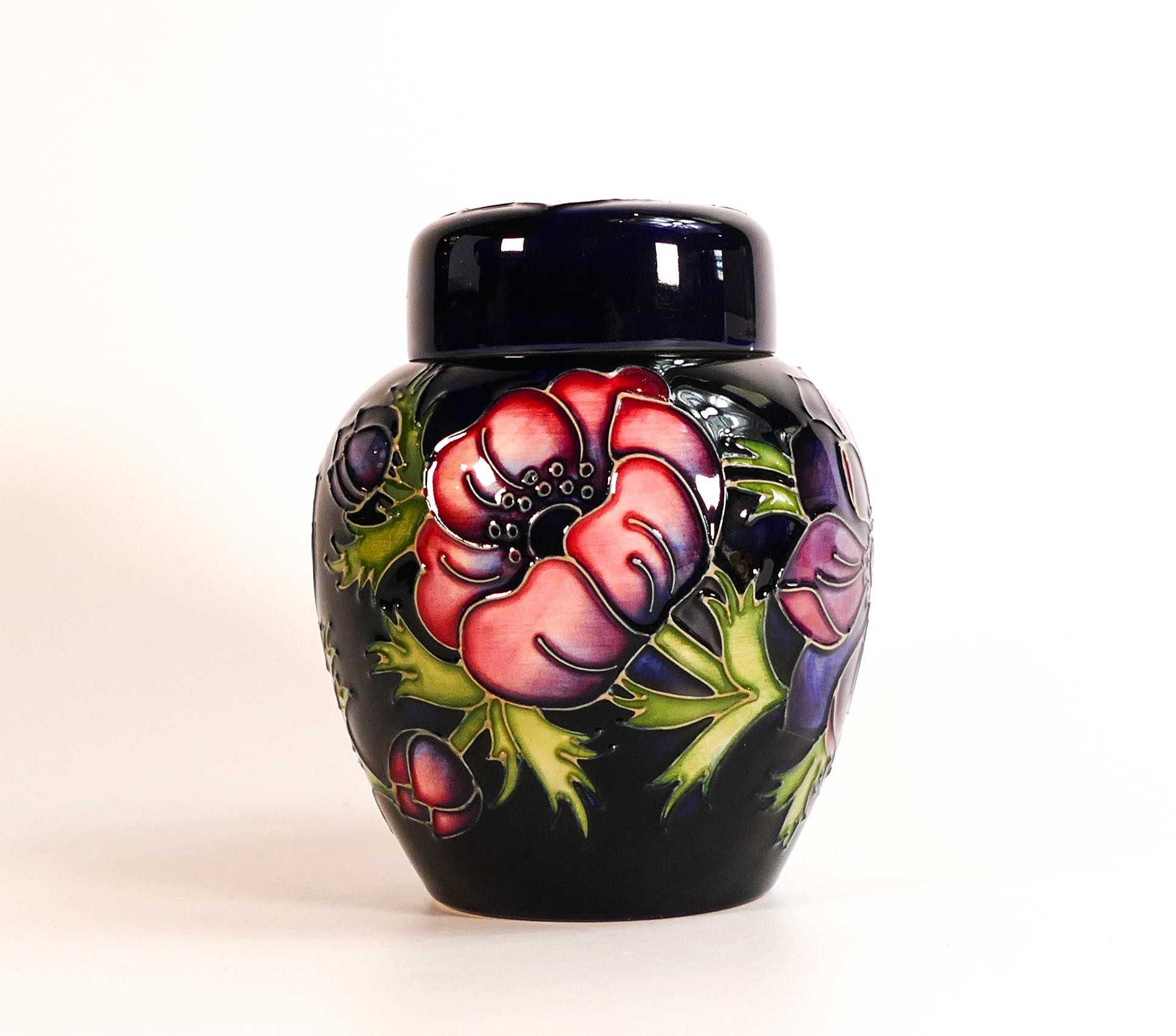 Moorcroft Anemone on blue ground ginger jar, boxed, height 16cm, crazing to base