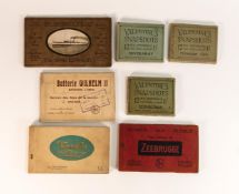 A collection of early 20th century postcards and tourists wallets. (7)