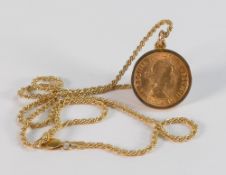 FULL sovereign gold coin QEII 1958, in loose 9ct mount and on a 50cm long, 9ct gold rope twist chain