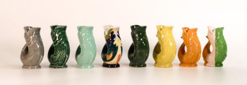 Wade collection of small multicoloured Gluggle jugs (one marked No.1 & one with hand written