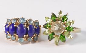 Two 9ct gold QVC ladies dress rings, one set with green stones, size M and the other set with blue