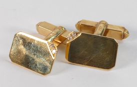 Pair of 18ct gold octagonal diamond set cufflinks, each set with two tiny diamonds to top corner,
