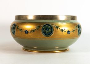 Moorcroft green Florian ware bowl with silver rim. Diameter 20cm All over crazing and hairlines to