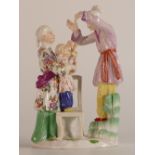 Meissen 20th century Oriental family group. Mother steadying her child on a chair, father stood