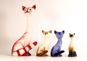 A collection of four mid century Sylvac cats, tallest 33cm (4)