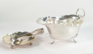 Silver sauce boat, hallmarked for Birmingham 1930, 79.5g, silver dish and pair of tongs, 70g. (3)