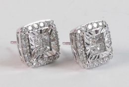 Pair 9ct white gold diamond set stud earrings, total of 48 diamonds (1 carat weight). Cost new in