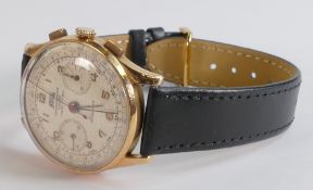 18ct gold gentleman's Egona chronographe Suisse wristwatch, c1960s with black leather strap, d.4cm.