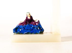 Royal Doulton early miniature figure Polly Peachum in blue/purple spotted colourway, mounted on