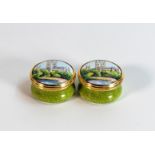 Two Moorcroft enamelled pill boxes, diameter 3cm (2)