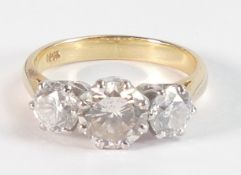 Three stone diamond ring set with three round cut diamonds, the centre stone 7mm x 7mm x 3.8mm,