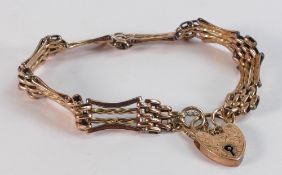 9ct gold antique rose gold gate bracelet with some overall light denting to the smaller links.