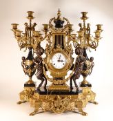 A quality "Imperial of Italy" garniture clock set, comprising brass, slate and bronze centre chiming
