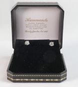 Pair of 18ct white gold diamond single stone set earrings, each set with round brilliant cut diamond