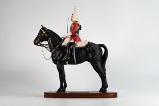 Beswick Connoisseur Lifeguard on horse 2562 on wooden plinth.