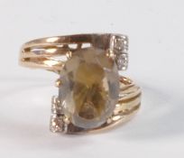 14ct gold crossover ring set with oval light brown stone, size M, 5.4g.