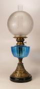 Victorian brass twisted column oil lamp with blue glass reservoir, chimney & shade, height