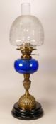 Victorian brass fluted oil lamp with Bristol blue glass reservoir, chimney & shade, height