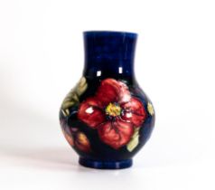 Walter Moorcroft vase decorated in the Anemone design, h.18cm, small underglaze chip to base edge.