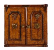 Late Victorian Smokers cabinet in the form of a two door safe with ebonised beaded doors