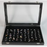 A good large collection of mainly costume jewellery rings, each set with various coloured stones, in