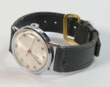 Timex stainless automatic wristwatch with leather strap.