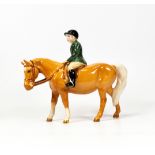 Beswick boy on Palomino pony 1500
