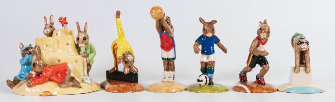 Royal Doulton Bunnykins figures consisting of Sandcastle, Swimmer, Basketball, Runner, Gymnast and