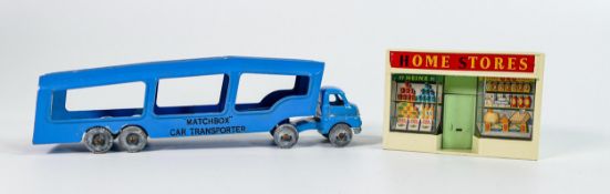 Boxed Matchbox Car transporter in clue and a No5 Home Stores accessory pack (2)