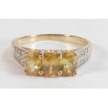 Ladies 9ct gold ring set with yellow stones, size N,2.2g.