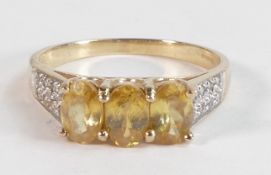 Ladies 9ct gold ring set with yellow stones, size N,2.2g.