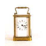 Brass French carriage clock, 15.5cm inc. handle. Key, but not Working.