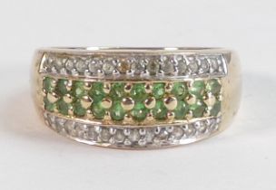 Ladies 9ct gold ring set with green stones, size N,5.1g.