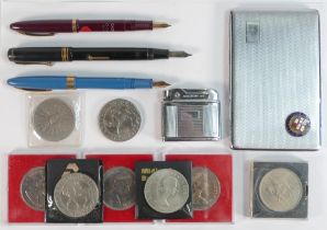 A collection of items including fountain pens by Conway Stewart and two Sheaffer,commemorative