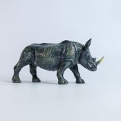 A Beswick England prototype figure of a Rhinoceros c2006, height 11cm, length 22 small chip to the