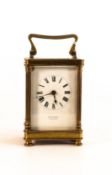 Brass French carriage clock, 15.5cm inc. handle, retailed by Butt & Co. Chester. Key, but not