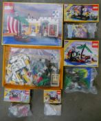 A collection of Boxed Pirate Theme Lego to include fort 6267, Raft 6257, Treasure Chest 6235,